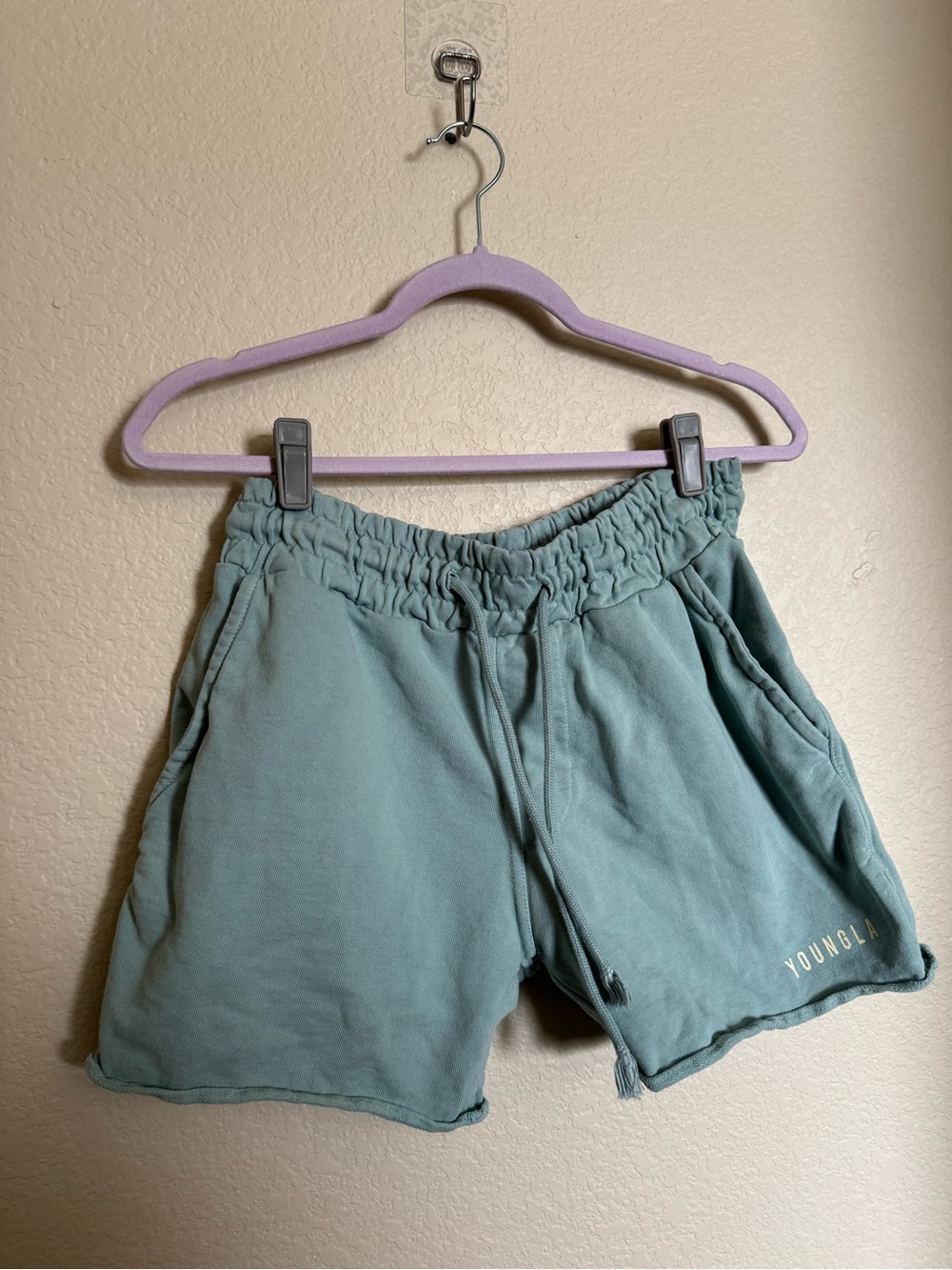 YoungLA shorts size large raw hem drawstring green